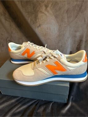 New Balance Beige and Orange Men’s Sneakers with Blue Midsole Accent
